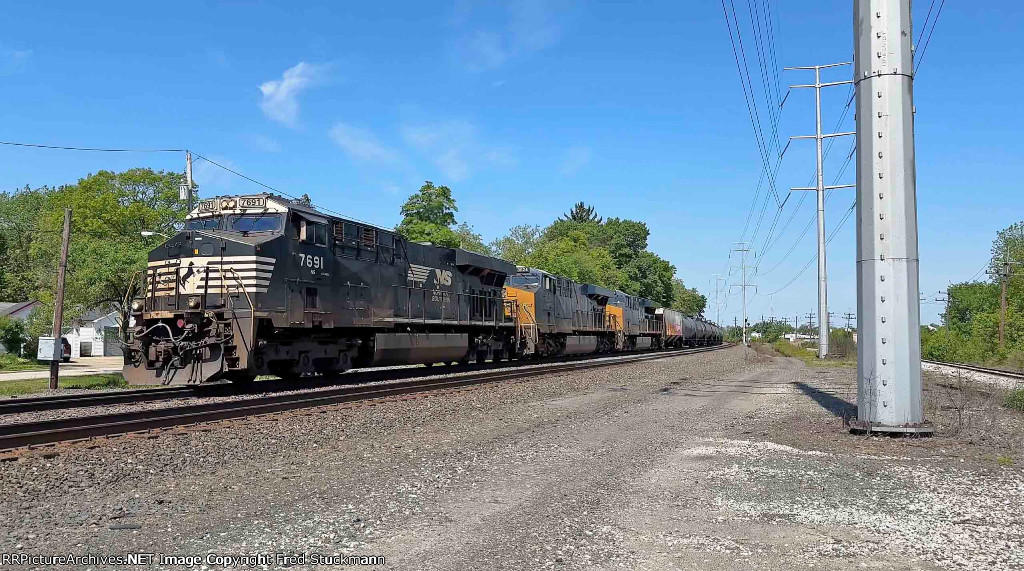 NS 7691 leads the gas cans.